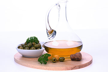 Оливкова олія з Італії допомагає їсти і не товстіти