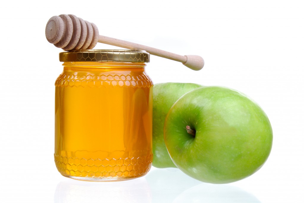 Мед та яблука - фото