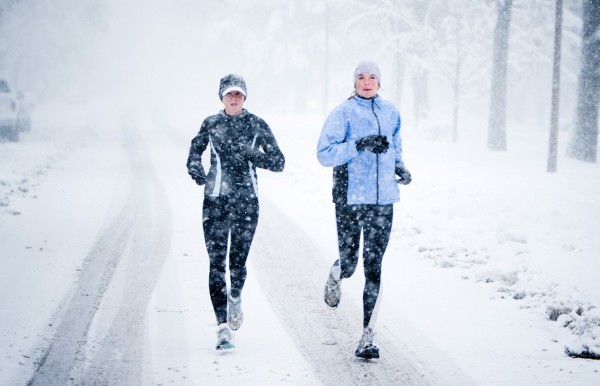 Kara Roy and Jennifer Lee and run down Mountain Avenue in a snowstorm.