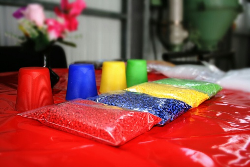 Close-Up Of Colorful Paraffin Wax Packets On Table - фото