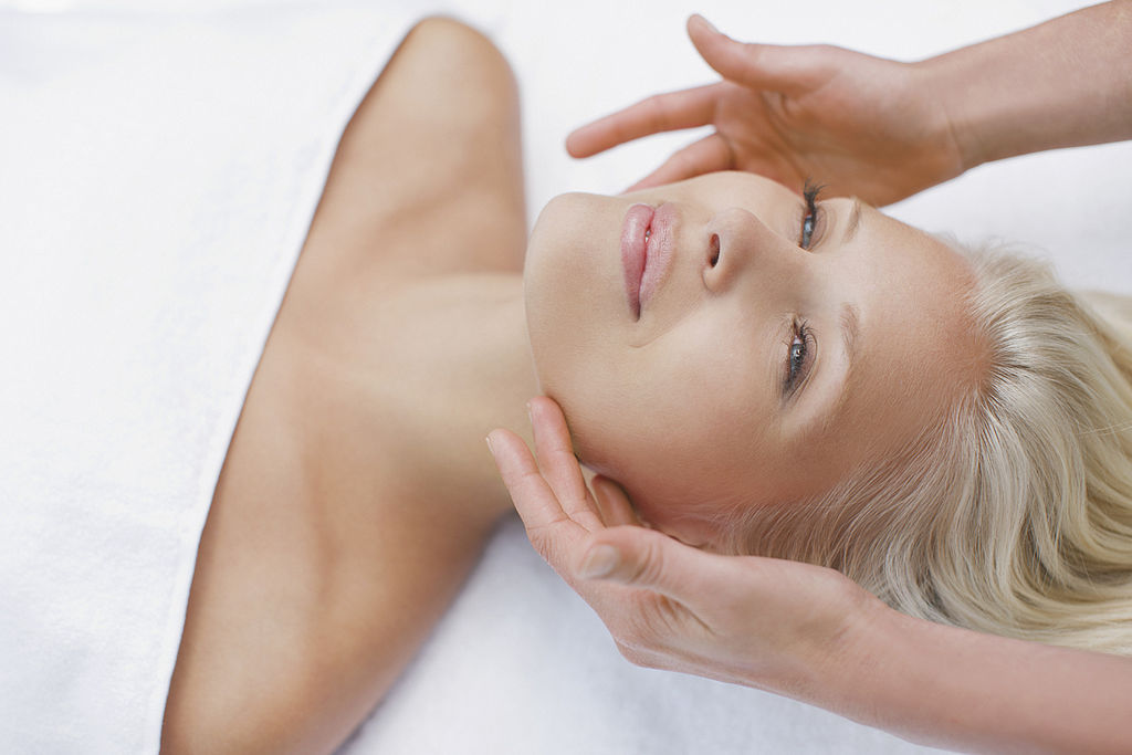 116378604 Woman enjoying facial - фото
