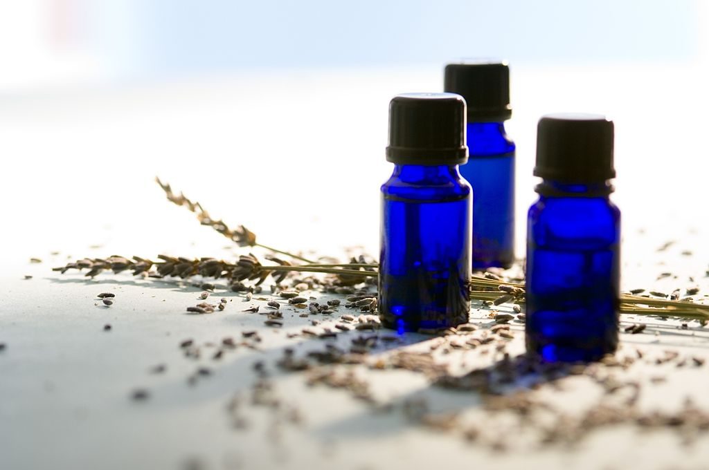 3 essential oil bottles, close-up - фото