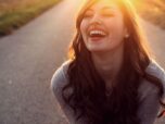 Happy girl laughing - фото