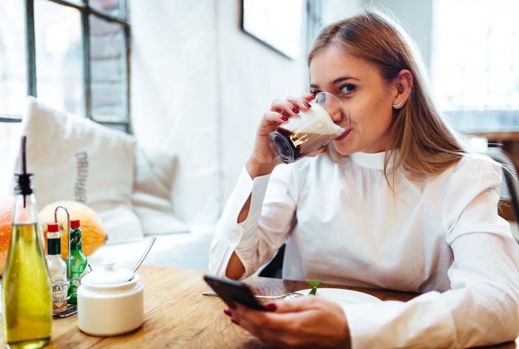 kaboompics-com_blonde-woman-drinking-her-coffee-at-the-restaurant