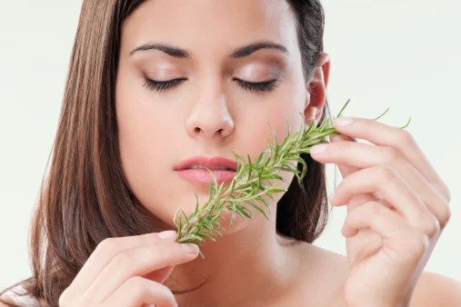 126167707-close-up-of-a-woman-smelling-aroma-herbs-gettyimages